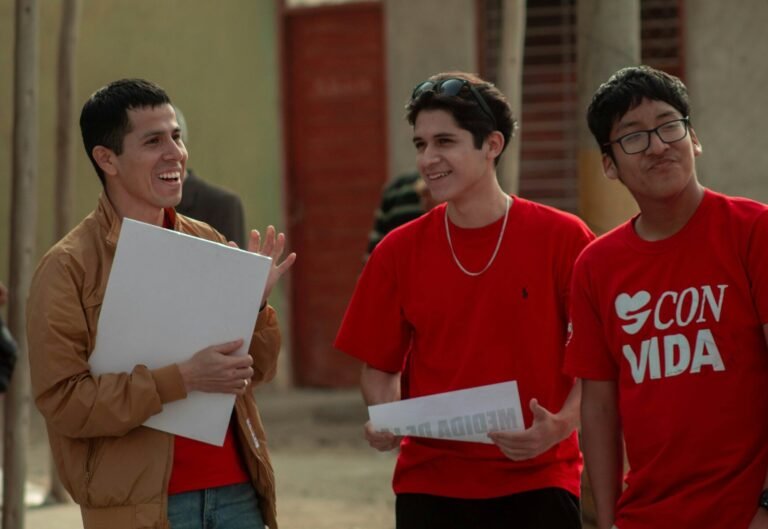 A group of people standing next to each other