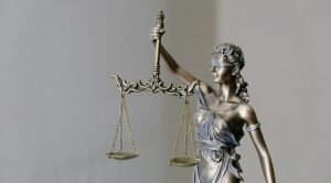 lady justice statue with scales and sword